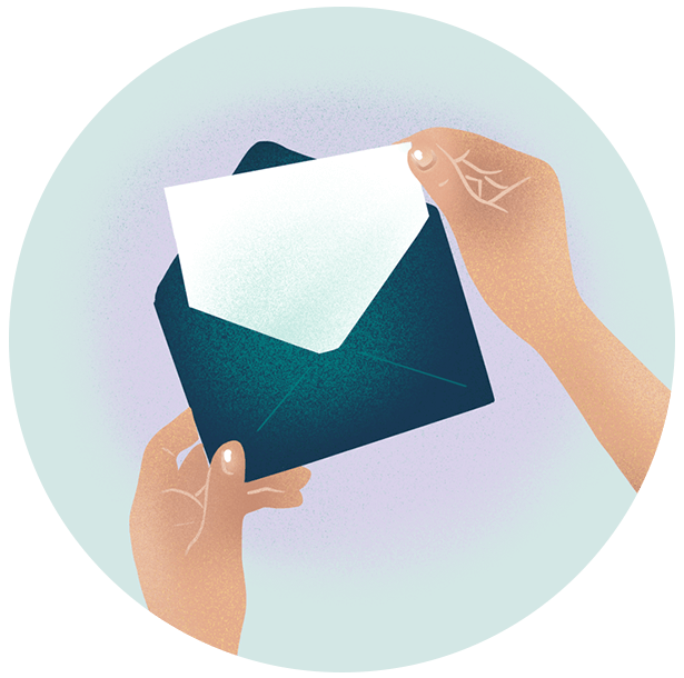 pair of hands pulling stationary from envelope