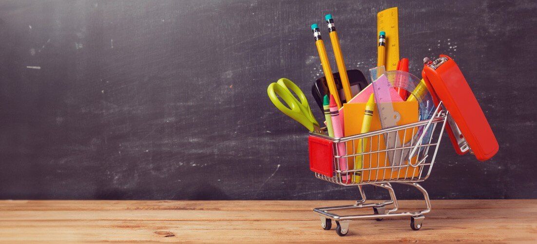 shopping cart full of school supplies